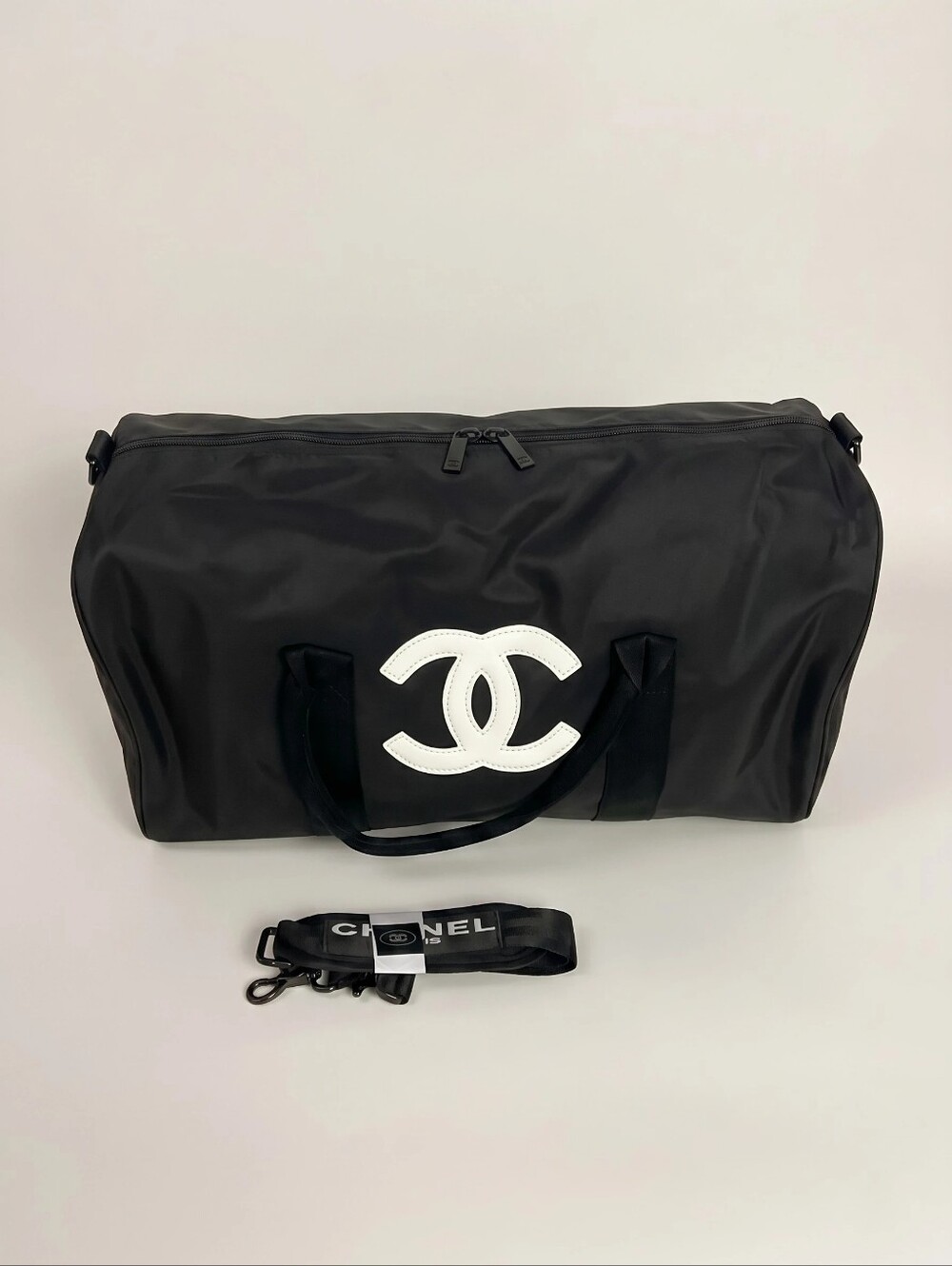 CHANEL Black Duffel with White Or Black CC Emblem - Picture 4 of 10